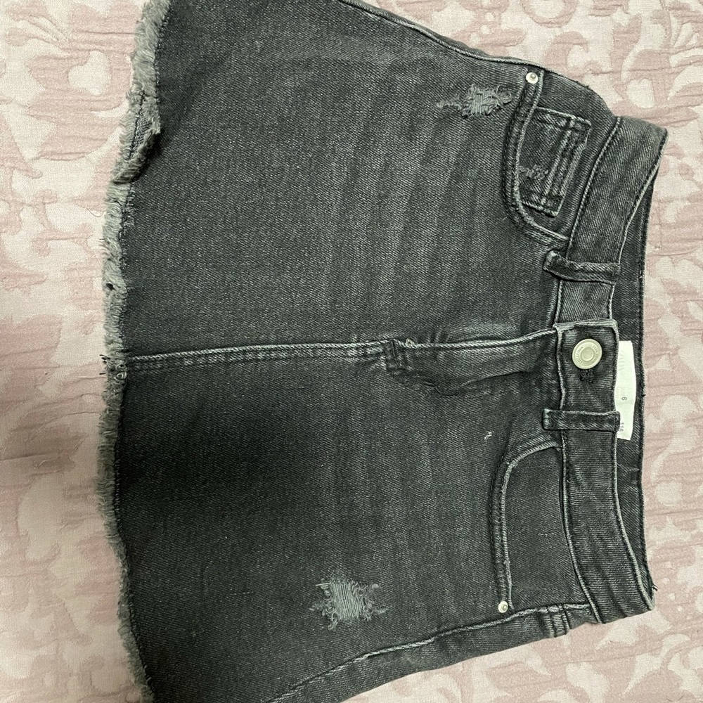 Black denim skirt